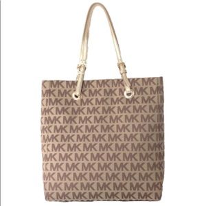 Used Michael Kors Long jet Tote with gold straps